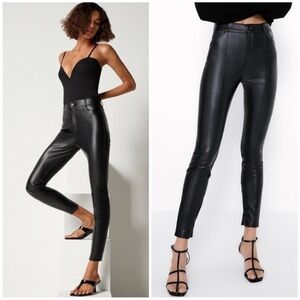 Zara sleek black faux leather pants with warm lining, zipper in the back hem.